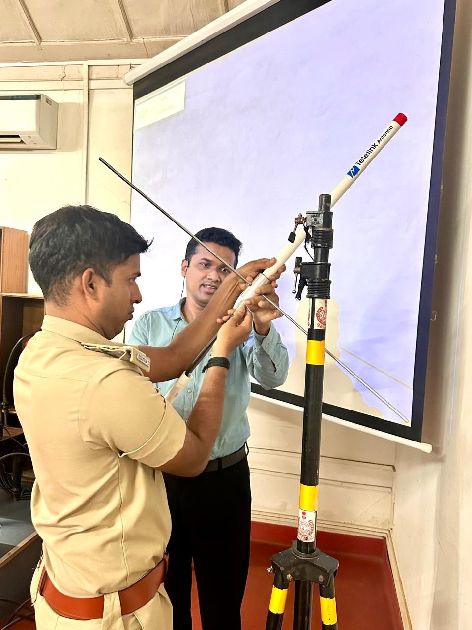 Close-up demonstration of antenna assembly during Goa Fire and Emergency Services training